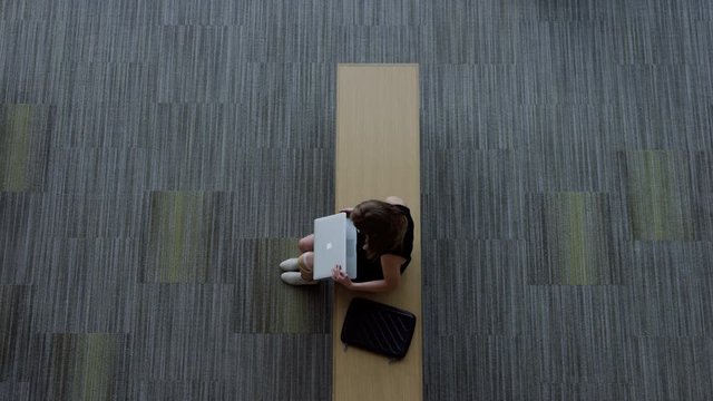 overhead shot of woman on lap top
