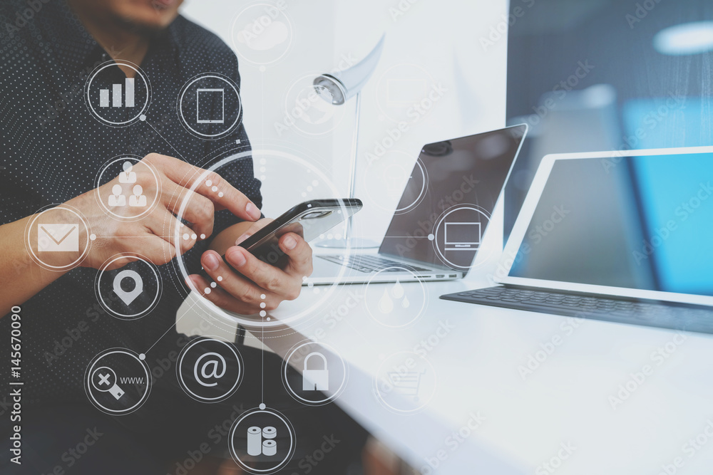 Aufkleber businessman working with smart phone and digital tablet and laptop computer in modern office