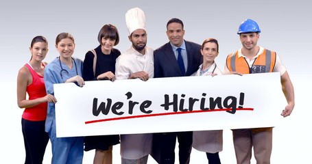 Various professional holding placard of were hiring text