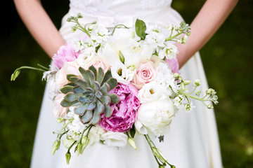 bridal bouquet with peonies and succulents
