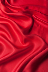 Red cloth waves background texture
