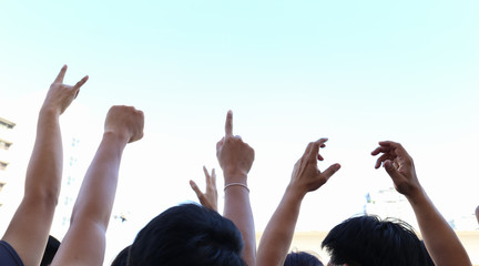 community initiative or concert concept, hands of group of people in the sky