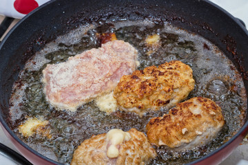 Cutlets from minced meat fried in a pan