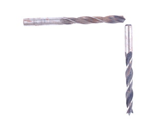 Drill bit on concrete on white background