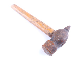 Old hammer with a wooden handle on a white background