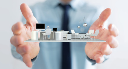 Businessman holding white 3D rendering apartment