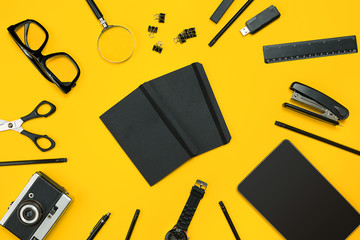 Workplace with office items and business elements on a desk. Con