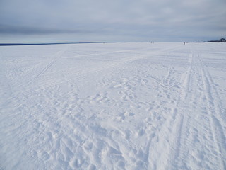 Fototapeta na wymiar trails on the lake in winter