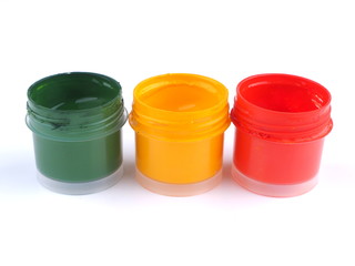 Jars with gouache on white background