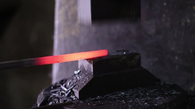 Using Pneumatic Hammer to Shape Hot Metal
