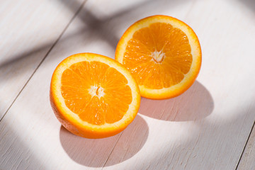 Half of orange on table.