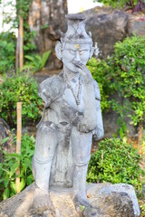 Fototapeta na wymiar anchorite stone statue at Wat Pho 