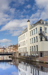 Fototapeta na wymiar Old building at a canal in Groningen