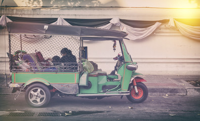 An unidentified driver tuk-tuk waiting customers on road