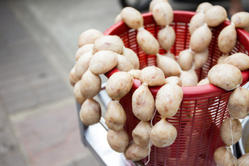 Traditional Thai E-Sarn meat ball close up.