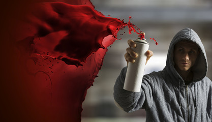 Guy drawing with spray . Mixed media