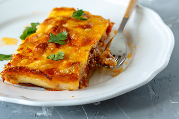 Greek style moussaka with eggplants, ground beef and potatoes.