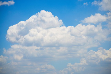 Naklejka na ściany i meble Blue sky with clouds background and textures. 