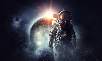 Fototapeta na wymiar Astronaut in outer space. Mixed media