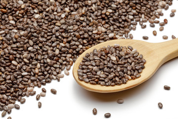 Chia seeds with a wooden spoon