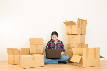 woman moving and using laptop