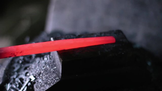 Using Pneumatic Hammer to Shape Hot Metal