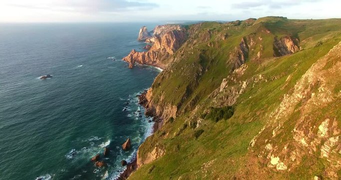 High coastline, Cabo da Roca, Portugal. Aerial view of mountains near Atlantic ocean.