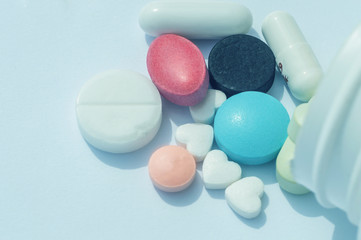 colored pills and jar