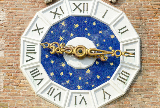 Ornate Clock With Celestial Motif On A Clocktower At The Porta Magna Complex Of The Venetian Arsenal In Venice, Italy