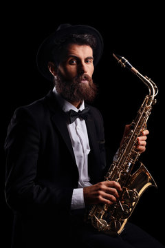 Bearded man with a saxophone