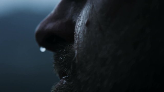 water dripping down mans face