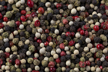 Four peppers background.