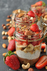 Dietary dessert with chia seeds, muesli and strawberries