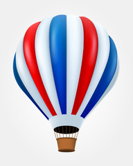 Hot air balloon in flight isolated on white.