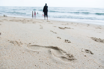 Footprints on the sand beach beach.