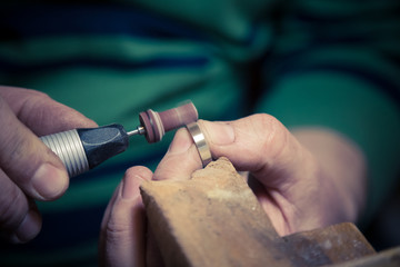Goldsmith working on wedding rings