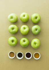 Green fresh apples and ingredient on paper background