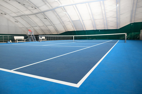 The abstract indoor tennis court Photos | Adobe Stock