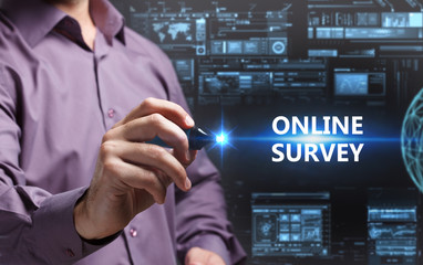 Business, Technology, Internet and network concept. Young businessman working on a virtual screen of the future and sees the inscription: Online survey