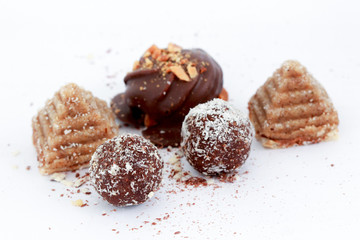 chocolate balls on white background