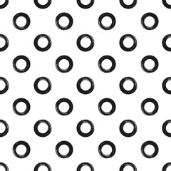 Ornament from circles painted with a rough brush. Seamless pattern with round shapes. Grunge, sketch.
