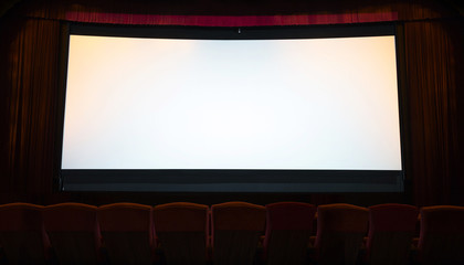 cinema screen with open red seats