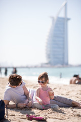 Mom and daughter on the beach