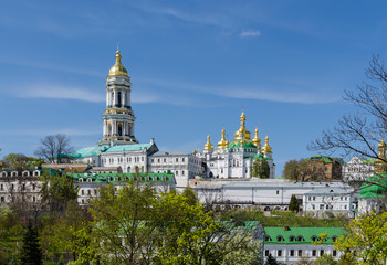 Fototapeta na wymiar KIEV, UKRAINE - April 17, 2017: Panoramic view of the Lavra Bell Tower and the Uspensky Cathedral of the Kiev-Pecherskaya Lavra,