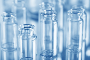 Different laboratory beakers and glassware. Glass jars of different sizes. Chemical glassware.