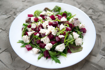 Beet salad, greens and ricotta cheese