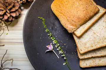 Whole wheat bread image on wood table in kitchen