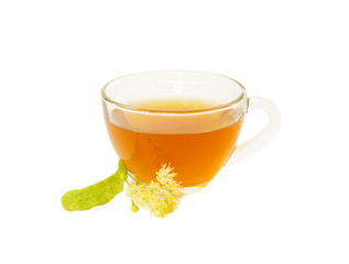 Glass cup of tea with linden isolated on white.