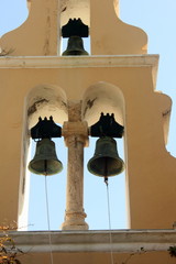 Obraz premium Greek Church Bell tower against blue sky with nobody 