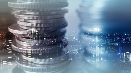 Double exposure of city and rows of coins for finance and banking concept
- 145735263
